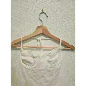 White Fox mini white halter dress, ruffles on hem. Sz Small